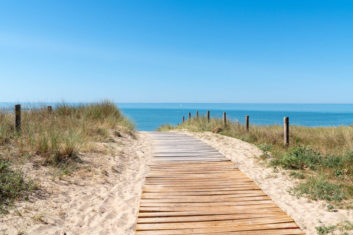 wooden path access in sand dune beach in Vendee on Noirmoutier I